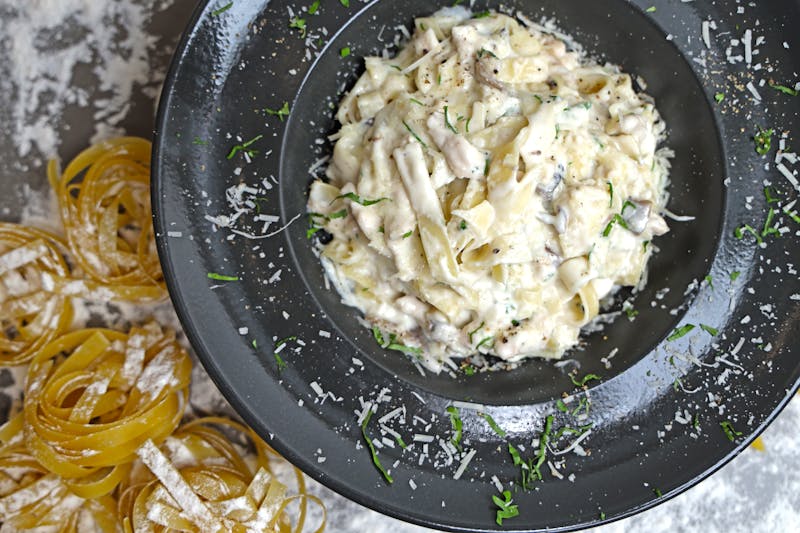 Creamy Fettuccine Alfredo with parmesan and butter sauce