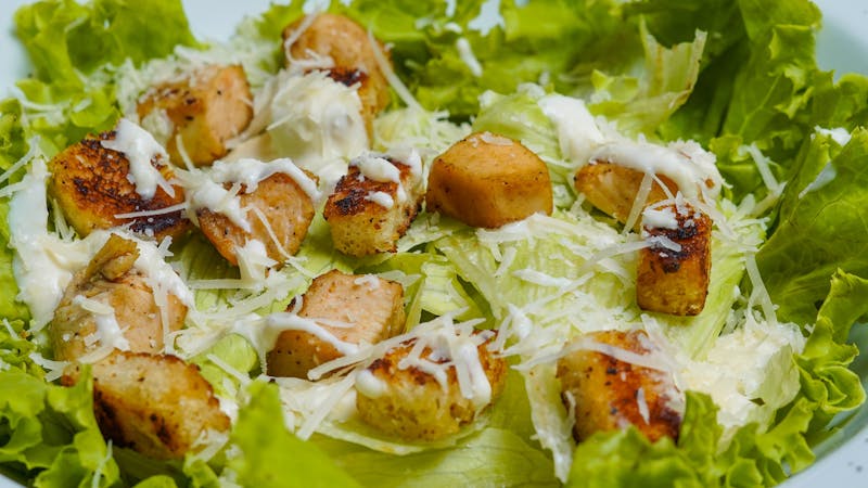 Fresh Caesar salad with romaine lettuce, croutons and parmesan
