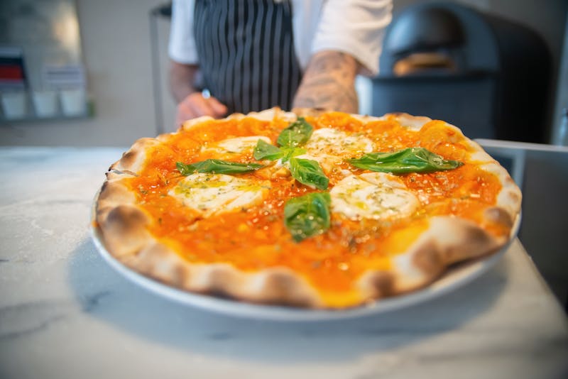 papa gino's Classic Margherita pizza with fresh basil and mozzarella